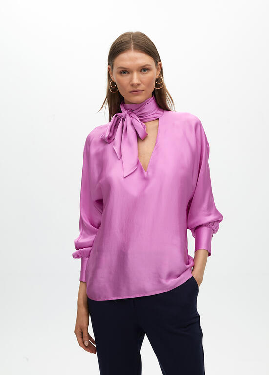 Flowing satin blouse with a bow